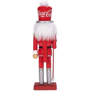 Coca-Cola branded wooden nutcracker in red Santa outfit with white fur trim and Coke cup hat