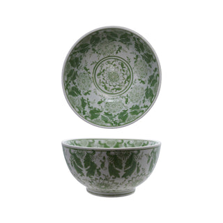 White stoneware bowl with green floral pattern shown from top and side views