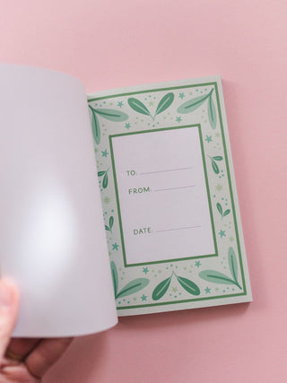 Interior gift dedication page of 100 Things I Love About Dad journal with green botanical border design