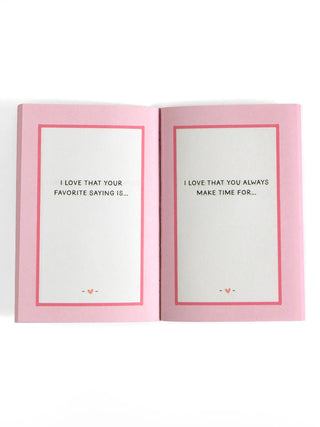 Open pink journal showing prompted pages about favorite sayings and making time for loved ones