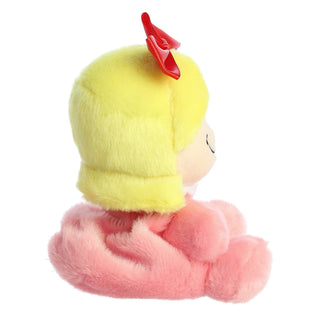 Aurora Palm Pals Cindy-Lou Who plush side view showing yellow hair with red bow and pink body