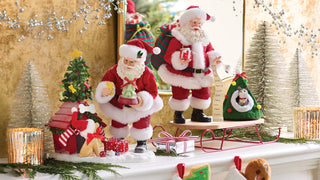 Department 56 Santa's Corner Confectionery Christmas village display with Santa figurines and decorations