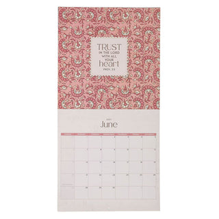 2027 wall calendar open to June page featuring floral pink pattern and Proverbs 3:5 scripture verse