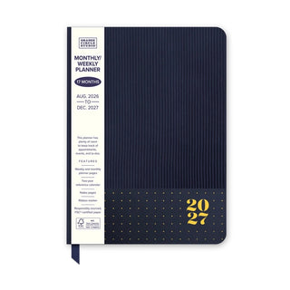 Navy blue 2027 planner cover with gold polka dots, ribbed texture, and Orange Circle Studio spine label