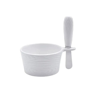 White ceramic dip bowl with woodgrain texture pattern and matching white spreader knife
