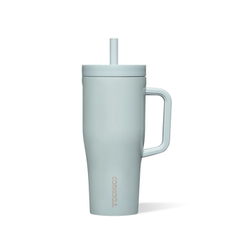 Corkcicle 22oz Cruiser tumbler in matte sky blue with handle and straw lid