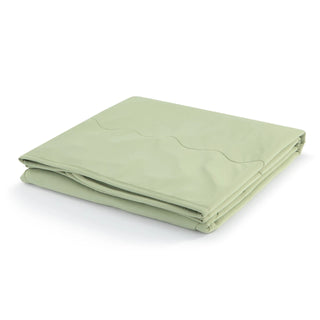 Demdaco weighted cooling lap blanket folded neatly in soft sage green with wave quilting detail