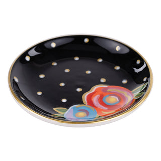 Glory Haus black ceramic trinket tray with gold polka dots and colorful floral design