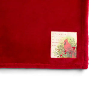 Red plush blanket with cardinal and holly patch reading loving memories poem