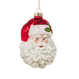 Glass Santa Claus head ornament with red hat, white beard, and holly accent