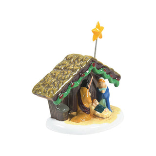 Department 56 Snow Village Nativity scene with stable, figures, and star