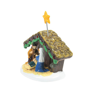 Department 56 Snow Village Nativity scene with stable, figures, and star