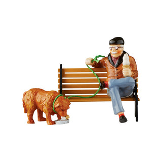 Department 56 Treats For Two figurine showing elderly man on bench with two dogs