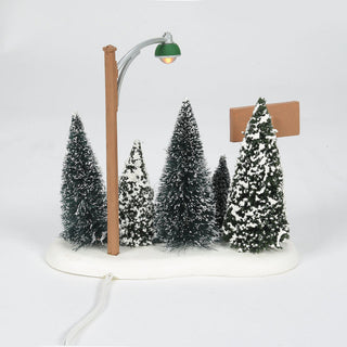 Department 56 Lit Christmas Tree Lot with miniature snow-covered evergreen trees and streetlight