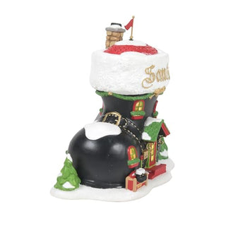 Department 56 Santa's Boot Shop Christmas village building with snow-covered boot design