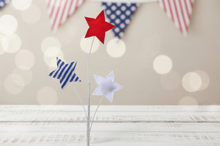 Decorative garden stake with red, white, and blue stars 