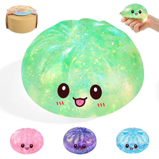 Green sparkly dumpling-shaped squishy fidget toy with cute kawaii face and multiple color variants
