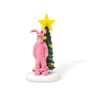 Department 56 Pink Nightmare Christmas village figurine with person in pink bunny suit by decorated tree