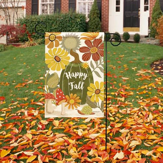 Happy Fall garden flag with autumn flowers and mushrooms displayed on lawn
