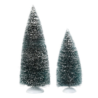 Two frosted green Christmas trees of different sizes with white snow accents on white bases