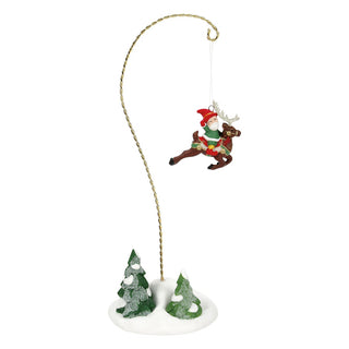 Department 56 Elf Spotlight Aerial decoration with elf riding reindeer above snow-covered trees