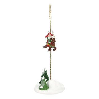 Department 56 Elf Spotlight Aerial ornament featuring elf climbing rope above Christmas tree