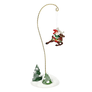 Department 56 Elf Spotlight Aerial decoration with elf riding reindeer suspended over snowy trees