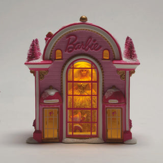 Department 56 Barbie boutique building collectible with pink facade and illuminated windows