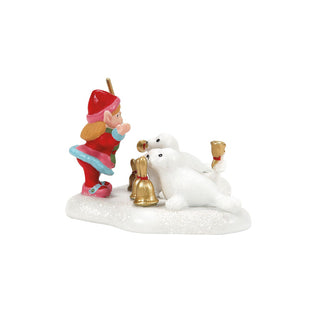 Christmas figurine showing elf with polar bear and golden bells on snowy base