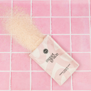 Sweet Grace Mineral Soaking Salts 2lb bag by Bridgewater on pink tile background