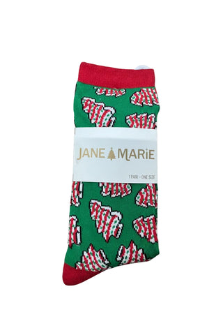 Jane Marie green Christmas crew socks with red cuff and Little Debbie cake pattern