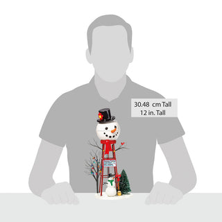 Department 56 Snowman Watertower collectible figurine with snowman head, red ladder structure and winter scene