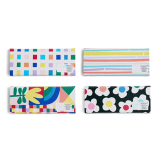 Set of four Demdaco collapsible sunglass holders in multicolor patterns including plaid, stripes, abstract, and floral.