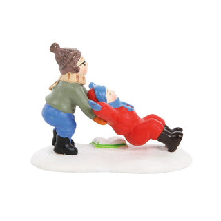 Department 56 Ralphie to the Rescue figurine showing winter scene with two characters
