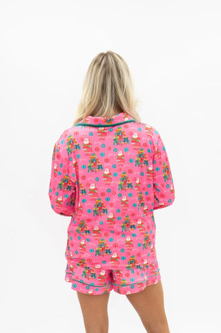 Pink Christmas Santa print short pajama set with green piping trim, back view