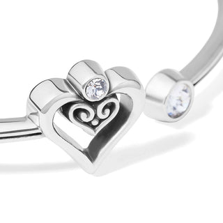 Brighton Alcazar Duet Heart open hinged bangle with silver-plated finish, ornate scrollwork inner heart, and bezel-set clear crystal detail