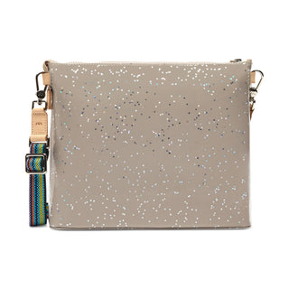 Glittery beige handbag with a colorful strap 