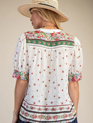 Woman wearing a floral blouse 