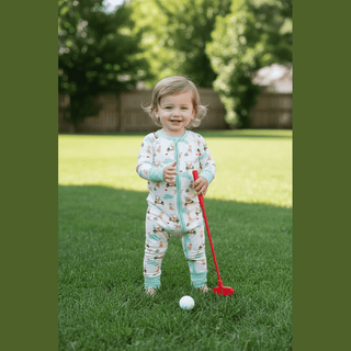 Barks & Birdies Zippie with toy golf club outdoors