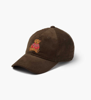 Dark brown corduroy baseball cap with embroidered teddy bear wearing a red holiday sweater