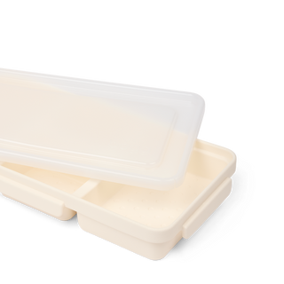 Open Bento Bogg container in coconut cream color with clear lid and divided compartments