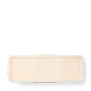 Top-down view of Baby Bento Bogg bag in Coconut cream color on white background