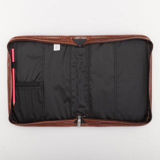 Interior view of Classic Brown Bible cover showing black fabric lining, pockets, and pen holder