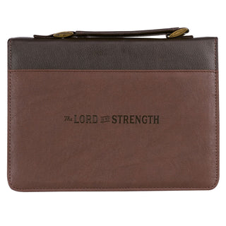 Two-tone brown faux leather Bible cover with 'The Lord Is My Strength' embossed text and carry handle