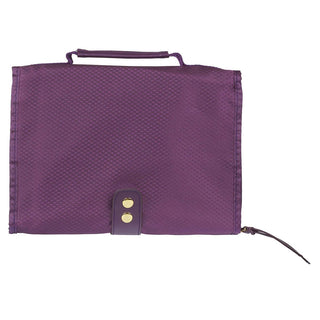 Back view of purple quilted tri-fold Bible cover organizer with gold snap closure and handle