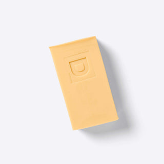 Duke Cannon Big Ass Brick of Soap 10oz bar in pale yellow with embossed D Supply Co logo