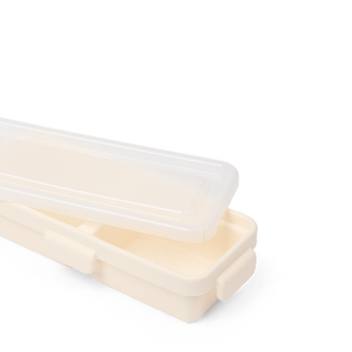 Open Bitty Bento Bogg storage case in Coconut cream color with translucent lid.