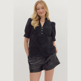 Black embroidered cotton women's top with floral applique, band collar, button front and puffed sleeves