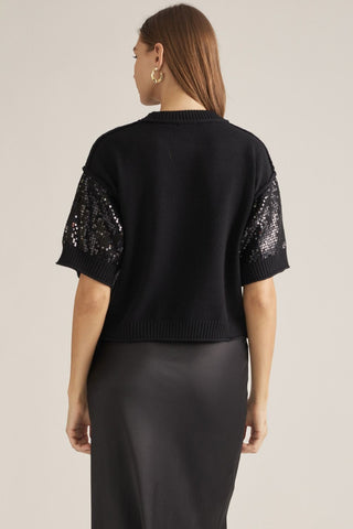 Entro black knit sweater with sequin sleeves and ribbed hem, back view