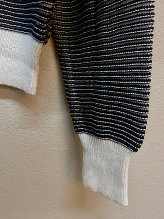 Black white tan striped knit pullover sweater with ribbed white cuffs